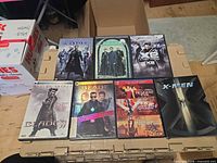 Front view of all seven DVD cases