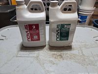 Both Novus 64oz bottles side by side