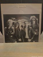 Front album cover showing title and band photo