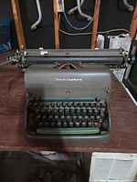 Front view of Remington Rand typewriter showing keyboard and carriage