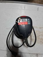 Top view showing label with electrical specs and cord