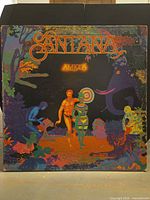 Front cover of Santana “Amigos” LP showing artwork and wear