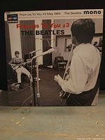 Front sleeve showing title, artist and photo