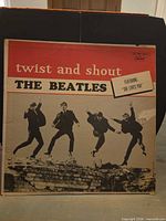 Front album cover showing title, artist, and photo