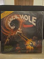 Front cover in shrink showing title and artwork