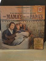 Front cover with shrinkwrap and album title