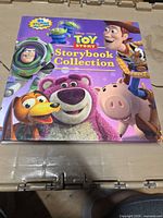Front cover showing title and Toy Story characters