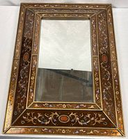 Full view of rectangular mirror showing frame and glass