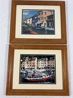 Two matching oak-framed photographs displayed together