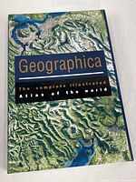 Front view of atlas in slipcase showing cover design and title