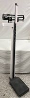 Full view of Health o meter beam scale showing column, base, and height rod