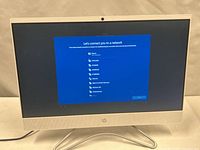 Front view powered on showing setup screen