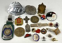 Overview of all pins, badges, medals, tie clip and whistle