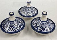 Three Moroccan mini tagines with lids shown together