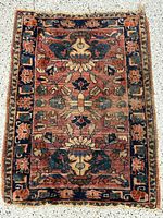 Full view of small Persian Sarouk rug