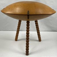 Full view of wooden saucer sewing stand on three bead-turned legs