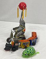 All three wind-up toys grouped