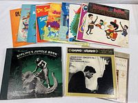 Group shot of all records fan-spread showing titles and cover art