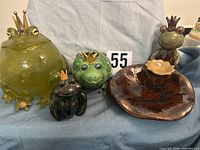 Group view of all four frog items