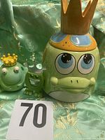 All three frog-themed items together for scale