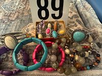 Group shot showing all rings and bracelets