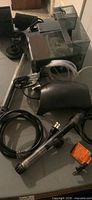 Top view of hang-on-back filter, sponge filters, heater rod, pump housing, airline tubing