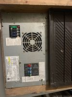 Full view of Centurion power converter panel with fan, fuse block and breaker cover