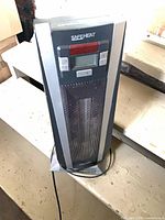 Front full view of SafeHeat tower heater showing height and design