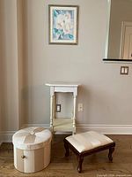 round striped ottoman, striped footstool, small side table, framed floral print