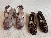 Both pairs of shoes side by side