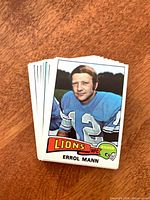Stack showing Errol Mann Detroit Lions kicker card on top