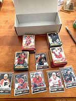 open storage box with several stacks of O-Pee-Chee hockey cards