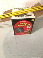 Imperial Polysweep Chimney Brush box front with four yellow rods on top
