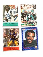 Group shot of all four football trading cards