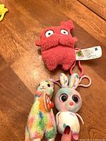 three plush keychains