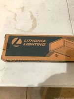 Closed carton showing Lithonia Lighting logo