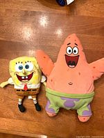 Front view of Patrick Star and SpongeBob plush toys