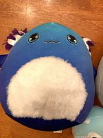 Blue axolotl-style plush front view
