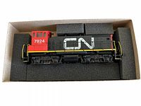 Athearn CN SW1500 locomotive in foam cradle