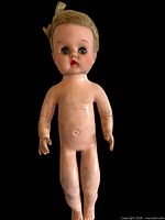 Full frontal view of doll showing entire body and condition