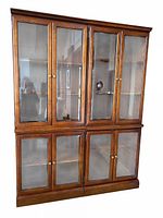 Front view showing full two-piece Bombay dark cherry glass display cabinet
