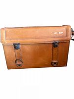 Brown leather Uher-branded carrying case front view