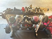 Overall rack with dumbbells, medicine balls, kettlebells and plates