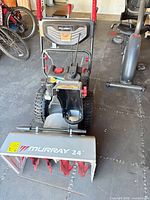 Front view showing Murray 24" housing and auger