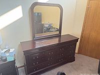 Front view of dresser with attached mirror