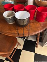 Six planters displayed on table