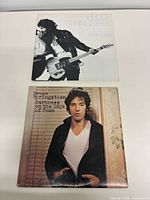 Front jackets of both Springsteen albums