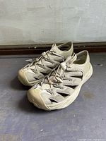 Left front side view of both shoes showing uppers and lacing