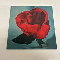 Front album jacket with red rose image