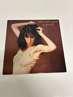 Front cover showing Patti Smith portrait and album title 